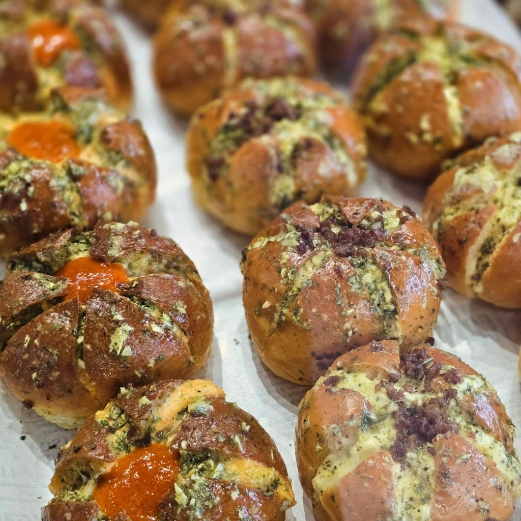 Garlic herb buns topped with beef floss and a dollop of chili sambal